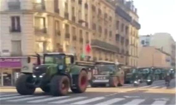 کشاورزان معترض فرانسوی با تراکتور وارد خیابان های پاریس شدند!